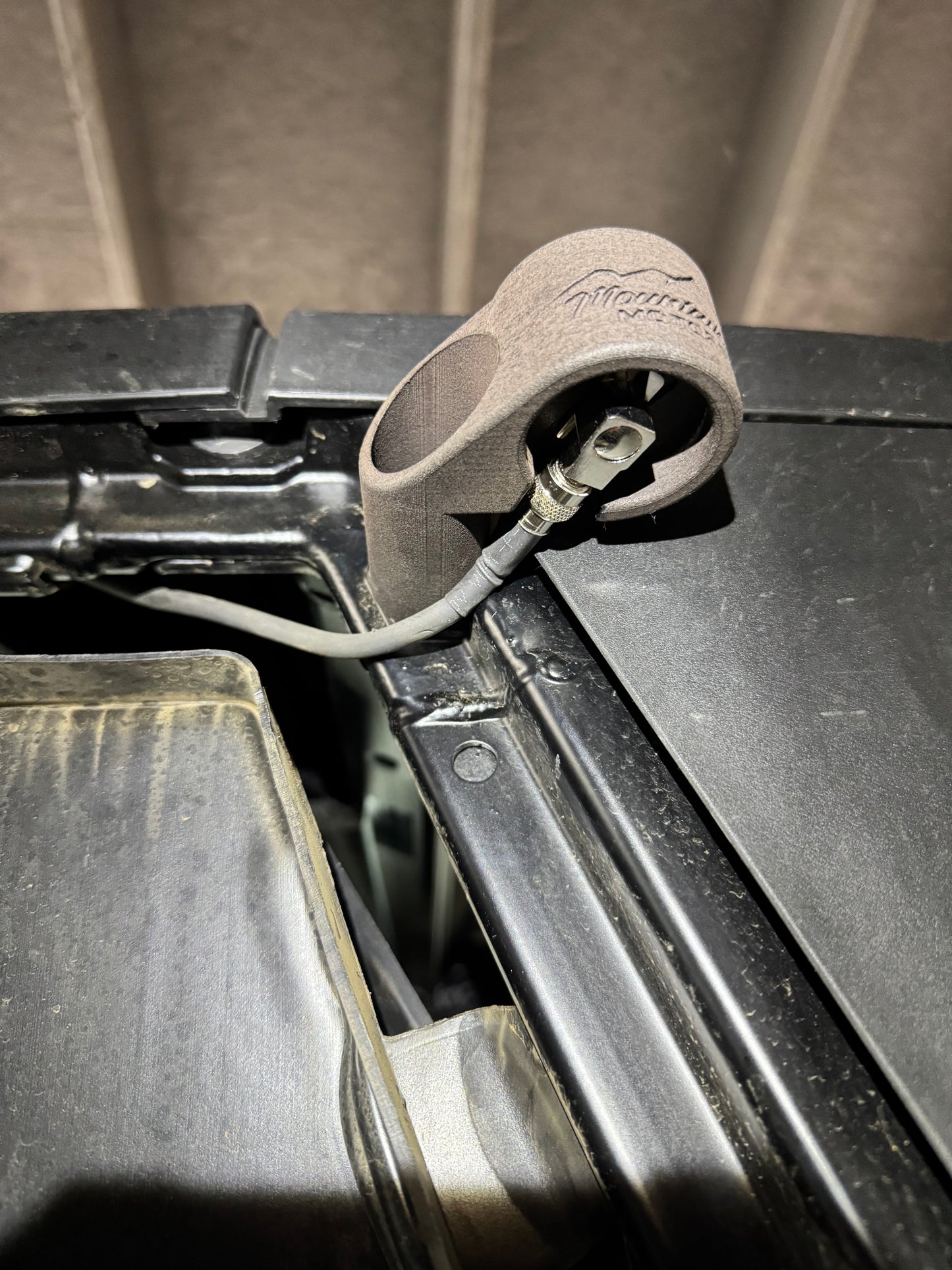 Introducing the custom antenna mount for the Polaris Xpedition UTV, designed specifically for Rugged Radios GMRS and Business Band antennas. This mount seamlessly integrates with your UTV's factory cage, utilizing the existing cage bolt for an easy, secure installation. The design ensures that the antenna coax cable is neatly hidden, providing a clean, professional look. Crafted with precision using a high-strength nylon material, the mount is 3D printed using Selective Laser Sintering (SLS) technology.